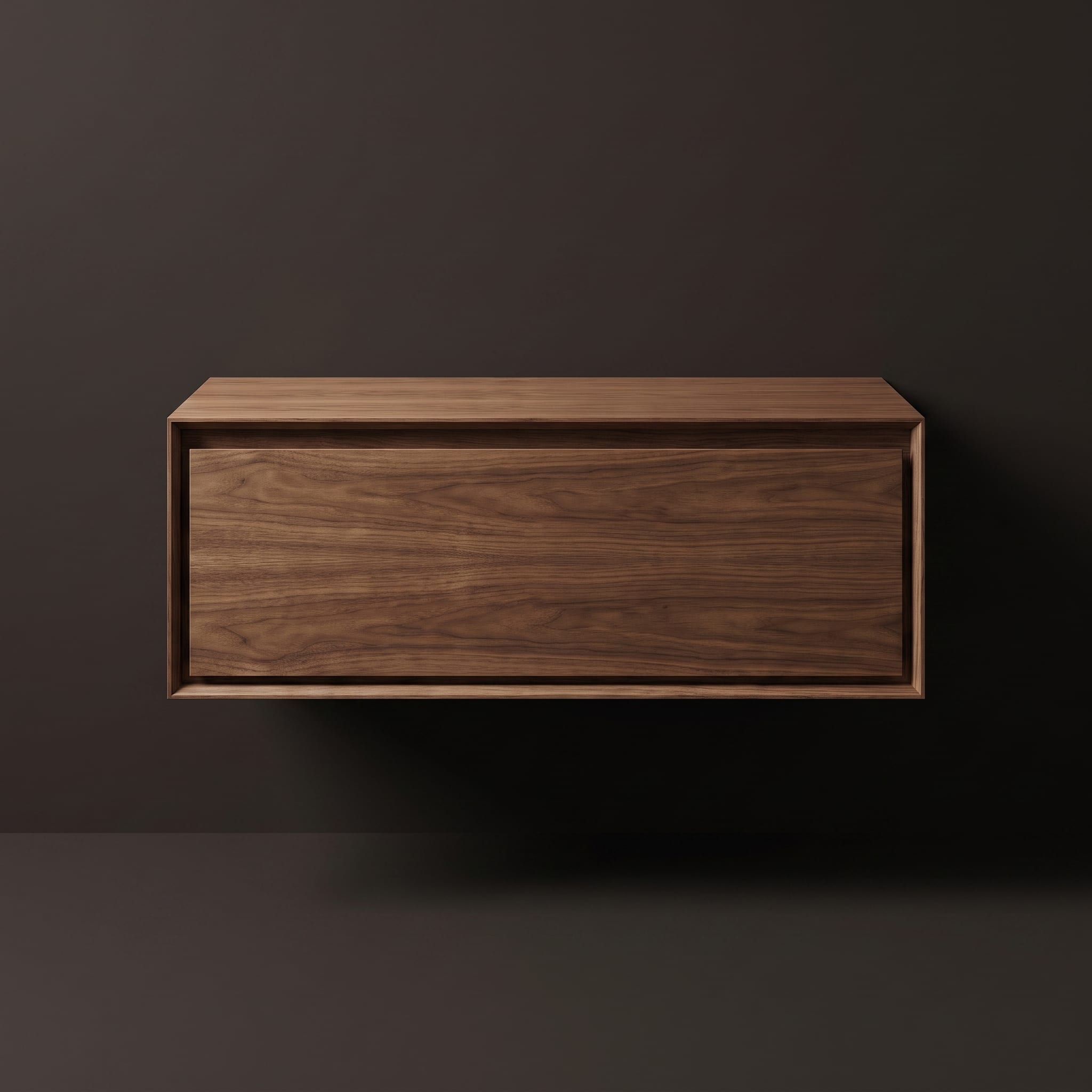 Close-up of a handleless floating walnut vanity showing natural amber wood grain against glossy black tile.