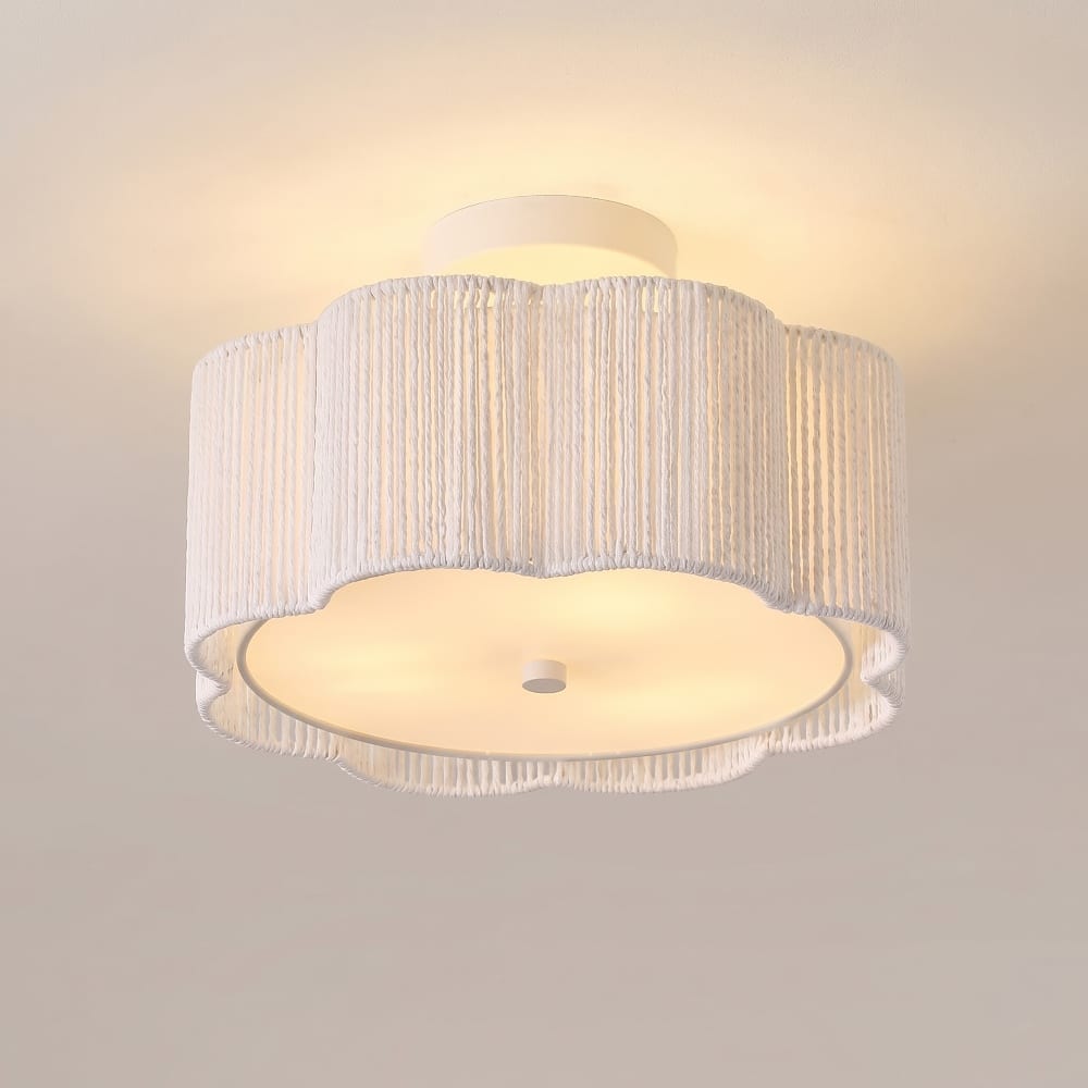 White woven scalloped semi-flush mount ceiling light with a frosted inner diffuser