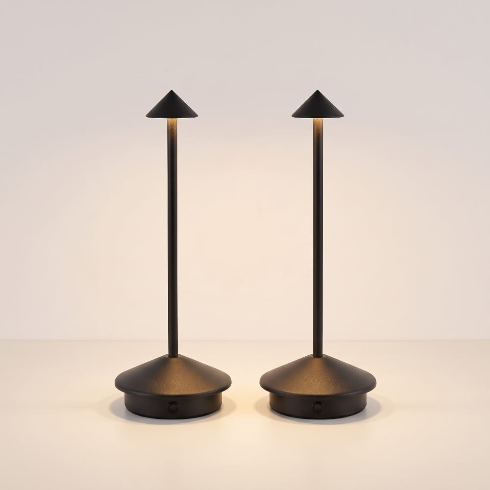 Pair of matte black cordless table lamps with cone shades and round weighted bases