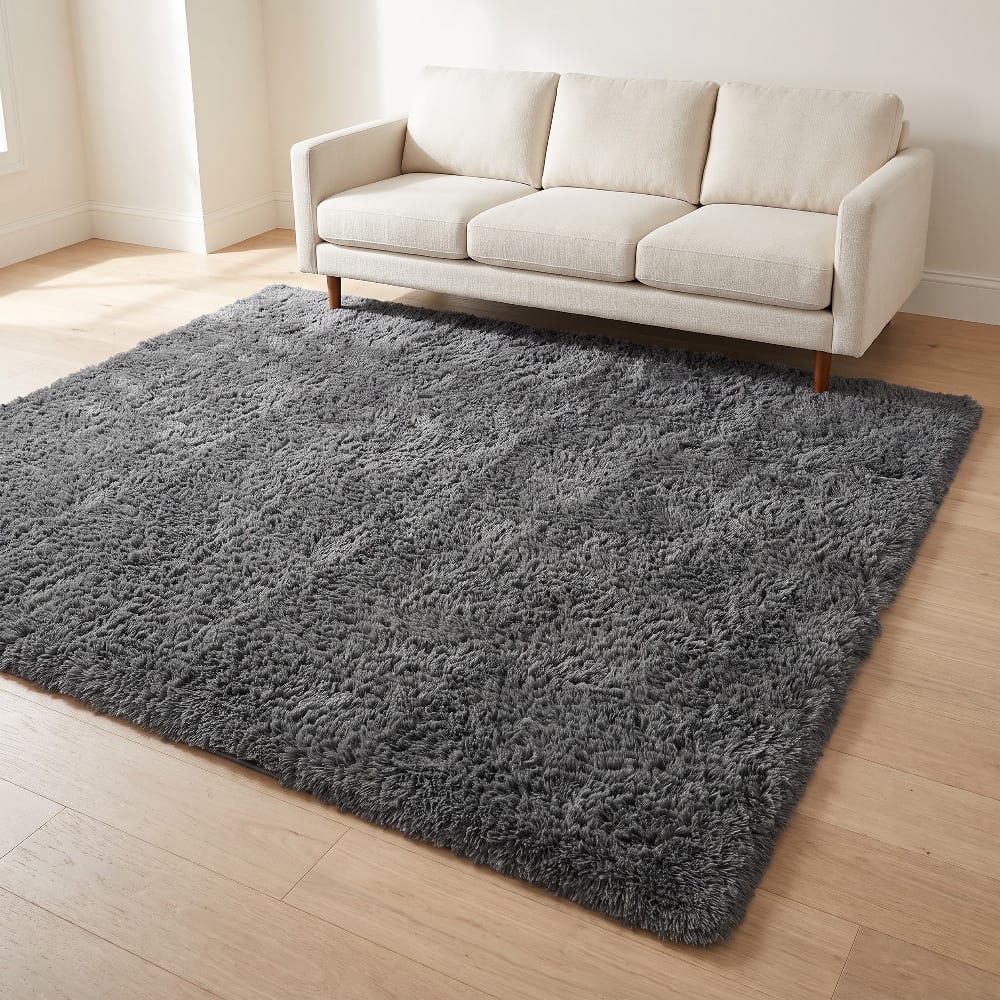 Gray high-pile shag area rug with dense plush fibers shown at a low angle